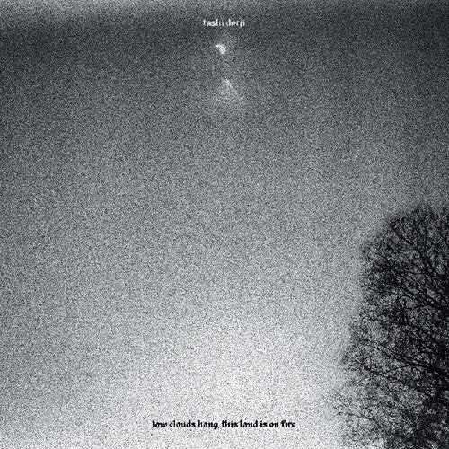 Tashi Dorji - low clouds hang, this land is on fire
