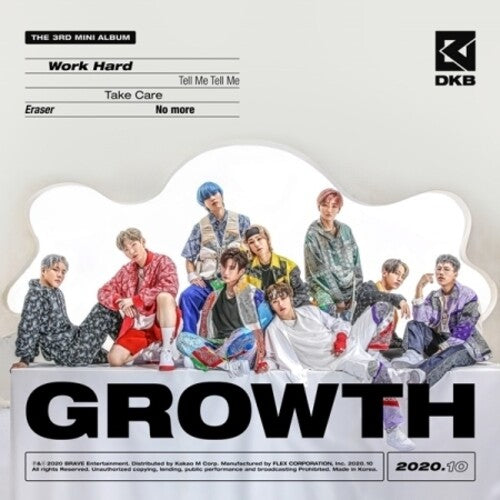Dkb - Growth (incl. 64pg Booklet, Postcard, Photocard + Sticker)